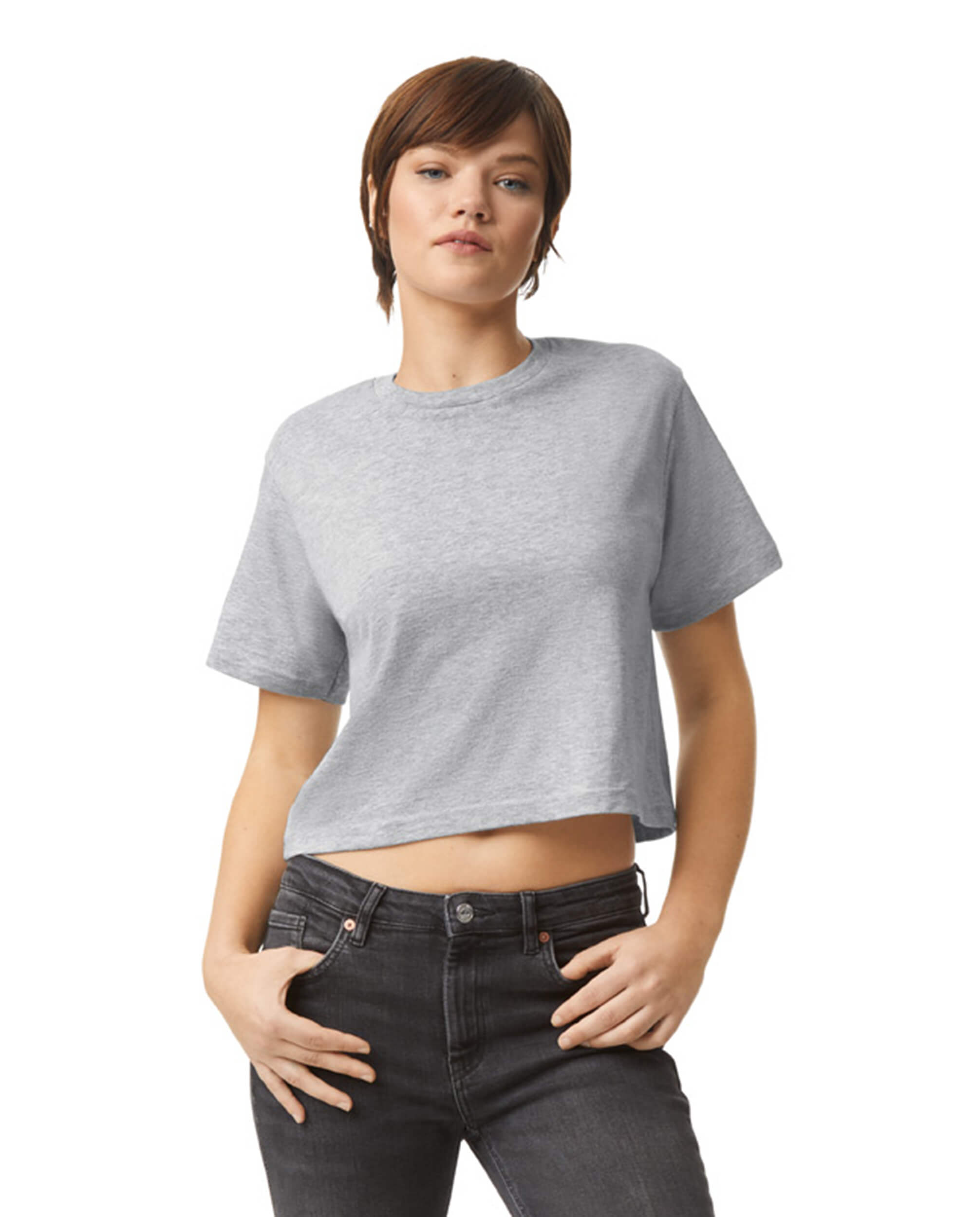 Female model wearing an American Apparel Fine Jersey Women's Boxy Tee in Heather Sport Grey, paired with black jeans, standing against a plain background (front pose) -heather sport grey