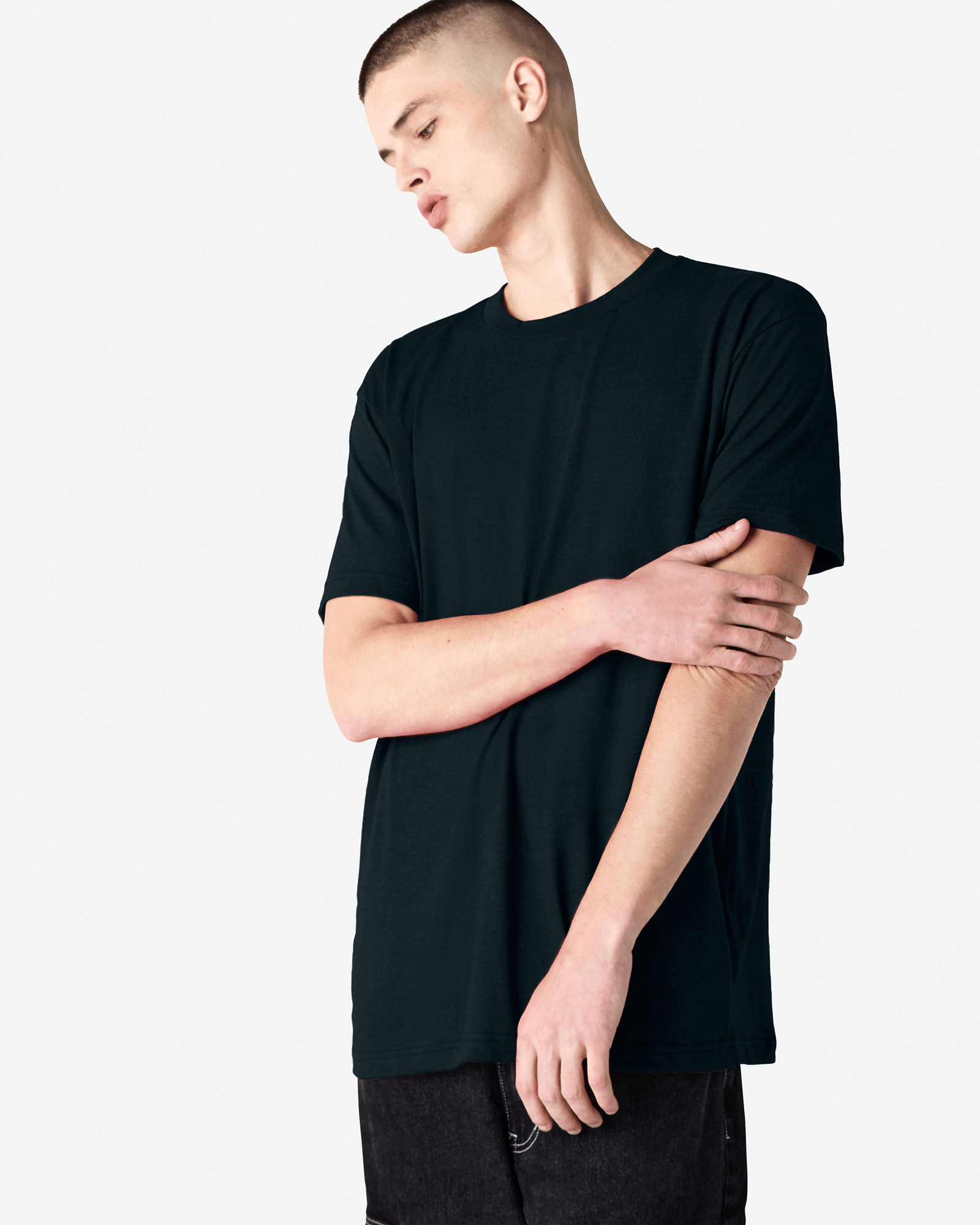 Male model wearing heather black colour CVC Unisex Short Sleeve Crew Neck Tee (front pose) -black