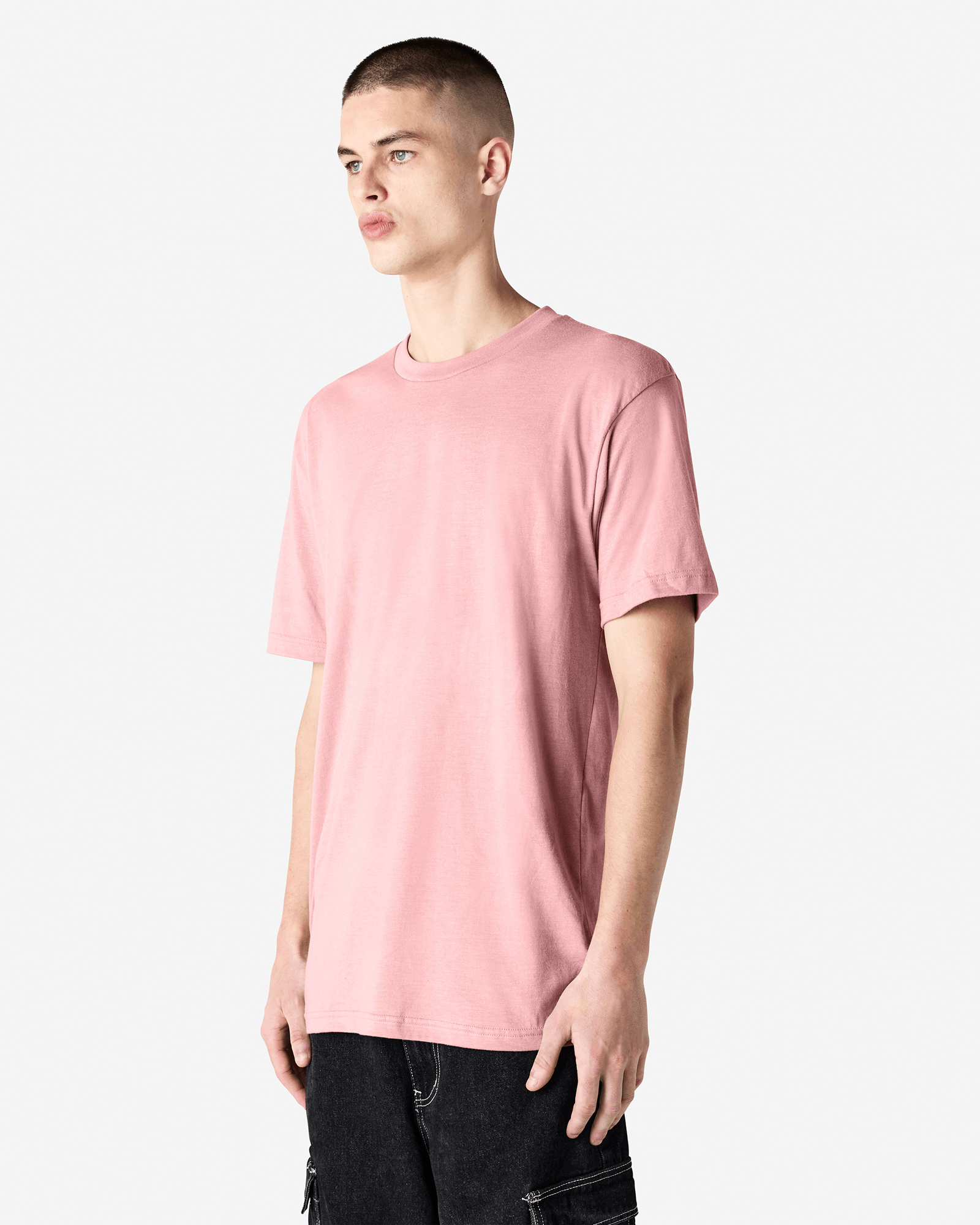 Male model wearing heather blush colour CVC Unisex Short Sleeve Crew Neck Tee (front pose) -heather blush