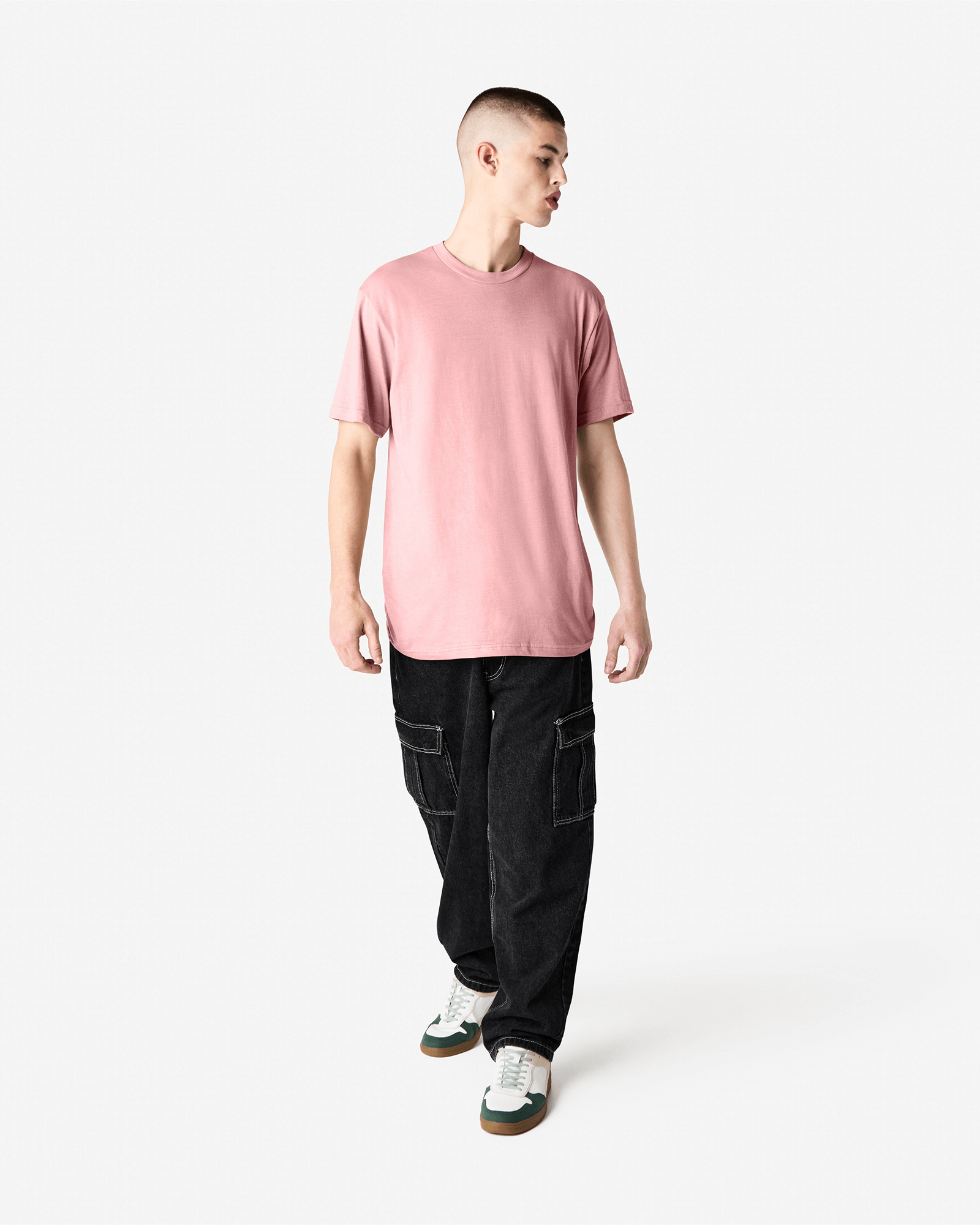 Male model wearing heather blush colour CVC Unisex Short Sleeve Crew Neck Tee (front pose) -heather blush