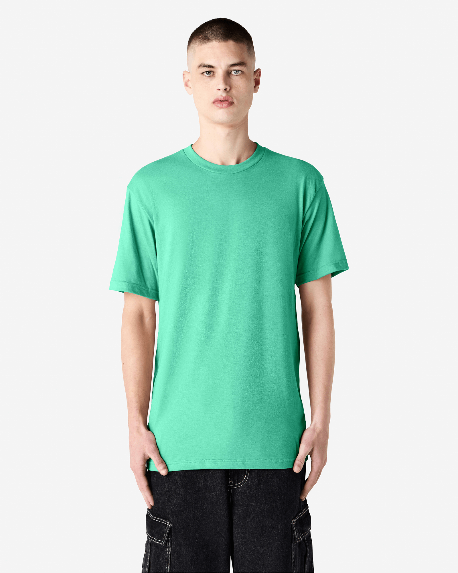 Male model wearing heather celadon colour CVC Unisex Short Sleeve Crew Neck Tee (front pose) -heather celadon