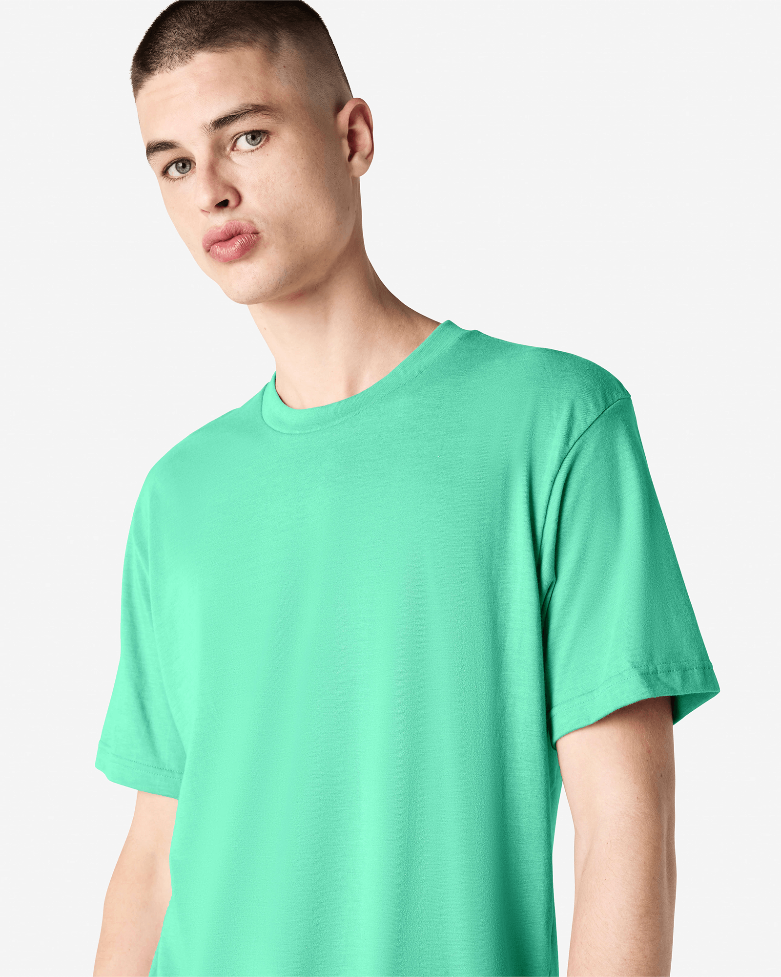 Male model wearing heather celadon colour CVC Unisex Short Sleeve Crew Neck Tee (front pose) -heather celadon