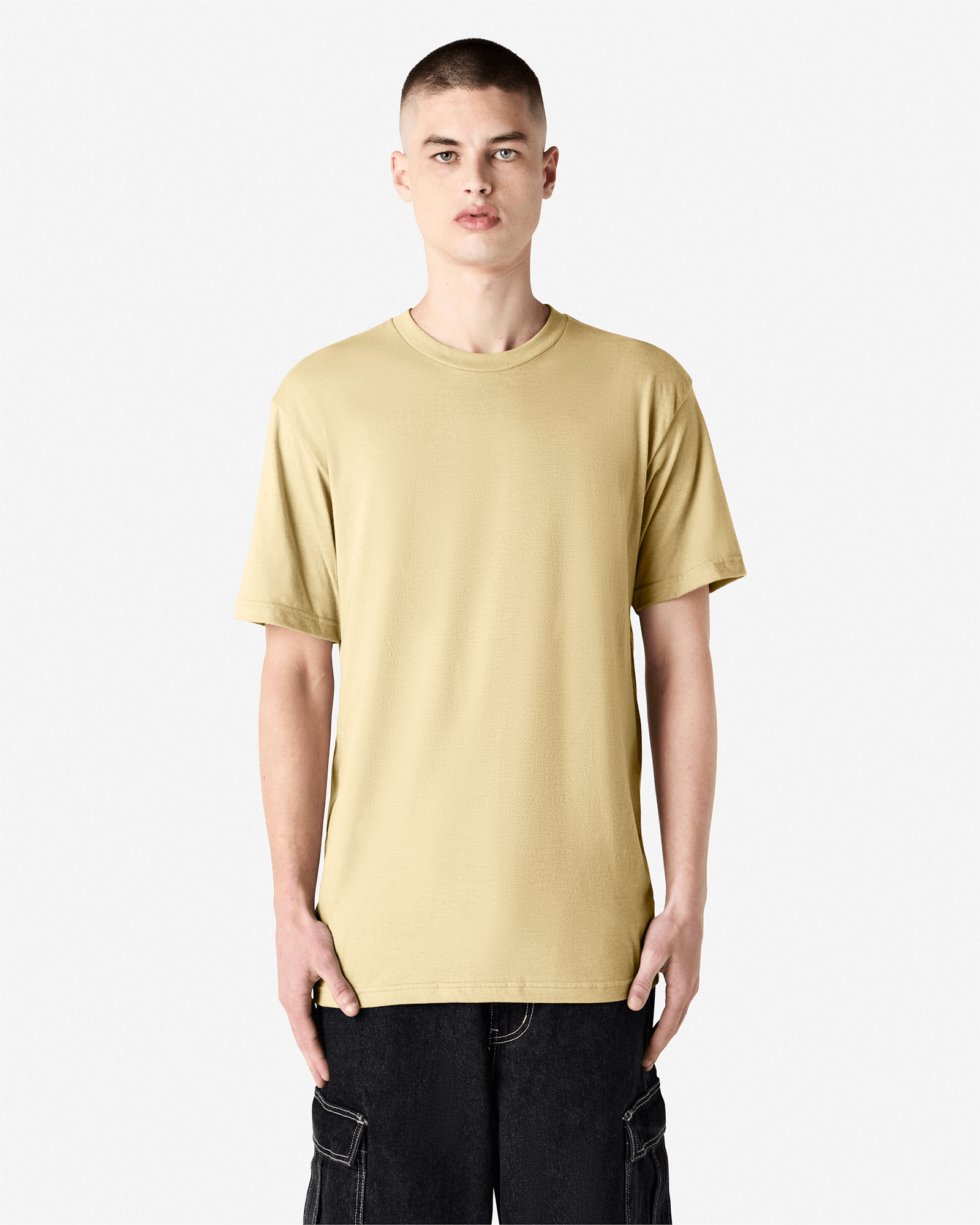 Male model wearing heather cream colour CVC Unisex Short Sleeve Crew Neck Tee (front pose) -heather cream