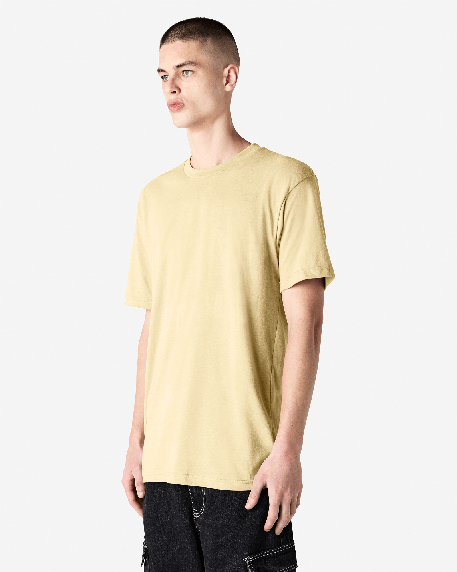 Male model wearing heather cream colour CVC Unisex Short Sleeve Crew Neck Tee (front pose) -heather cream