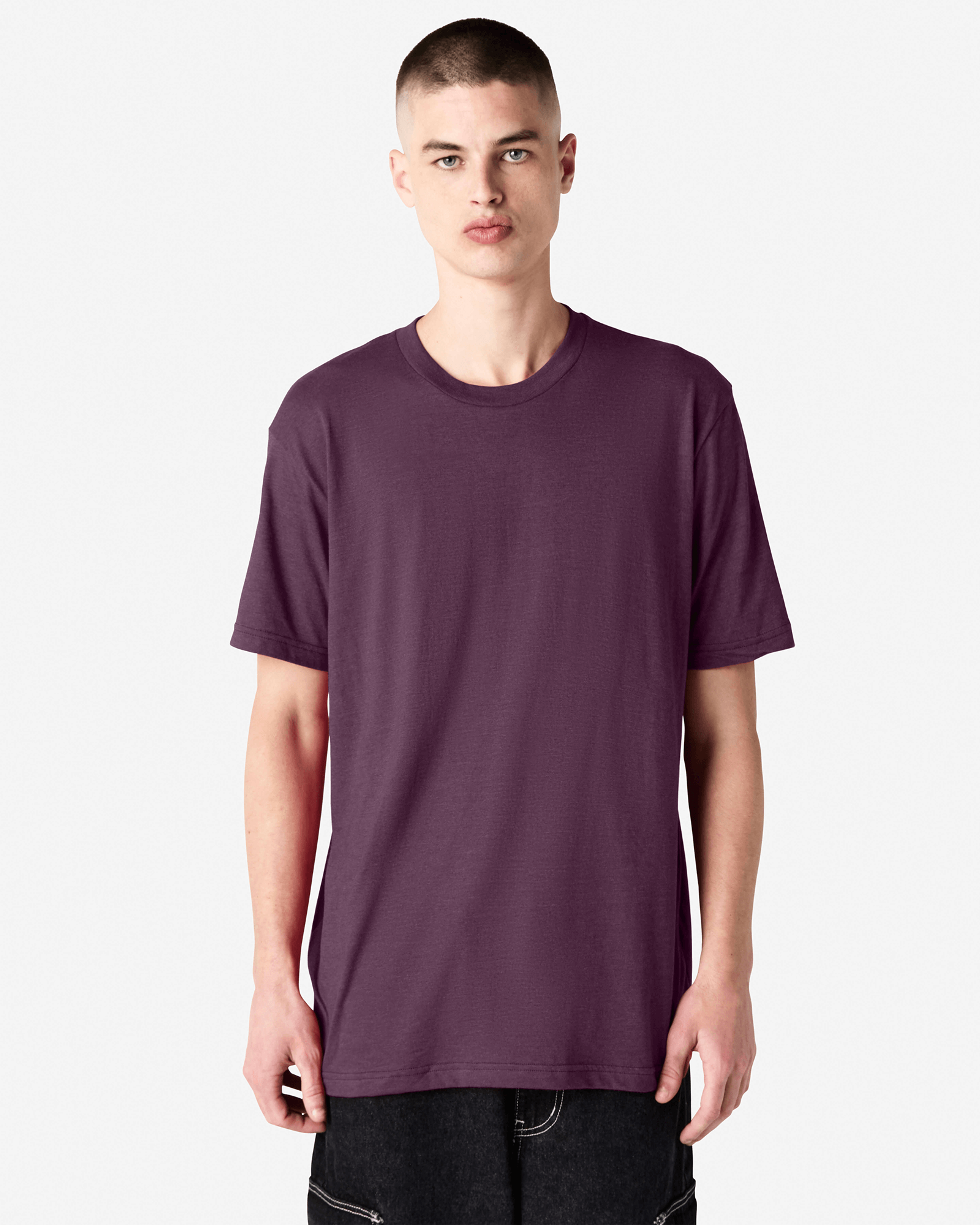 Male model wearing heather eggplant colour CVC Unisex Short Sleeve Crew Neck Tee (front pose) -heather eggplant