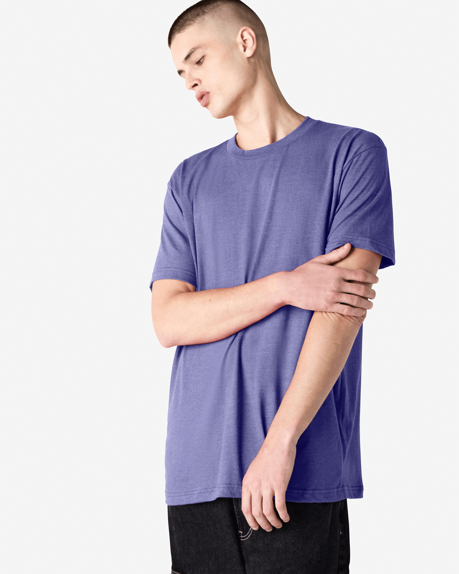 Male model wearing heather grape colour CVC Unisex Short Sleeve Crew Neck Tee (front pose) -heather grape