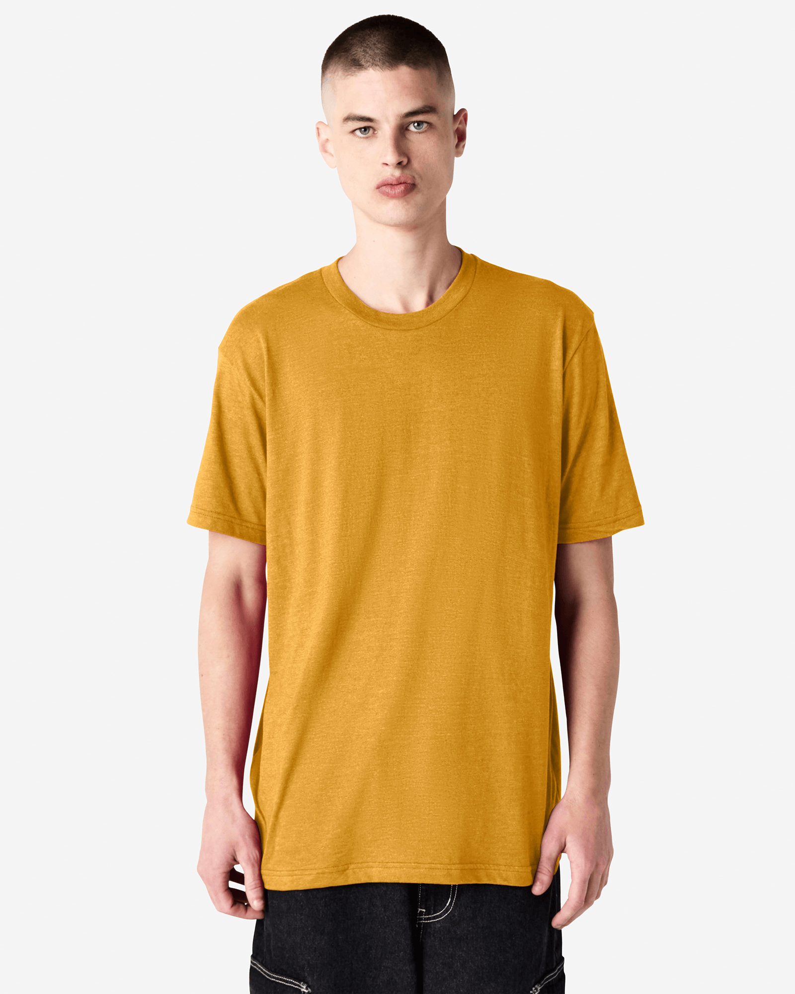 Male model wearing heather mustard colour CVC Unisex Short Sleeve Crew Neck Tee (front pose) -heather mustard