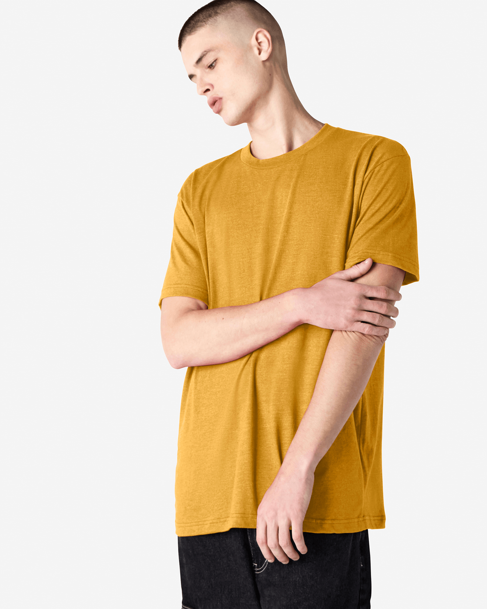 Male model wearing heather mustard colour CVC Unisex Short Sleeve Crew Neck Tee (front pose) -heather mustard