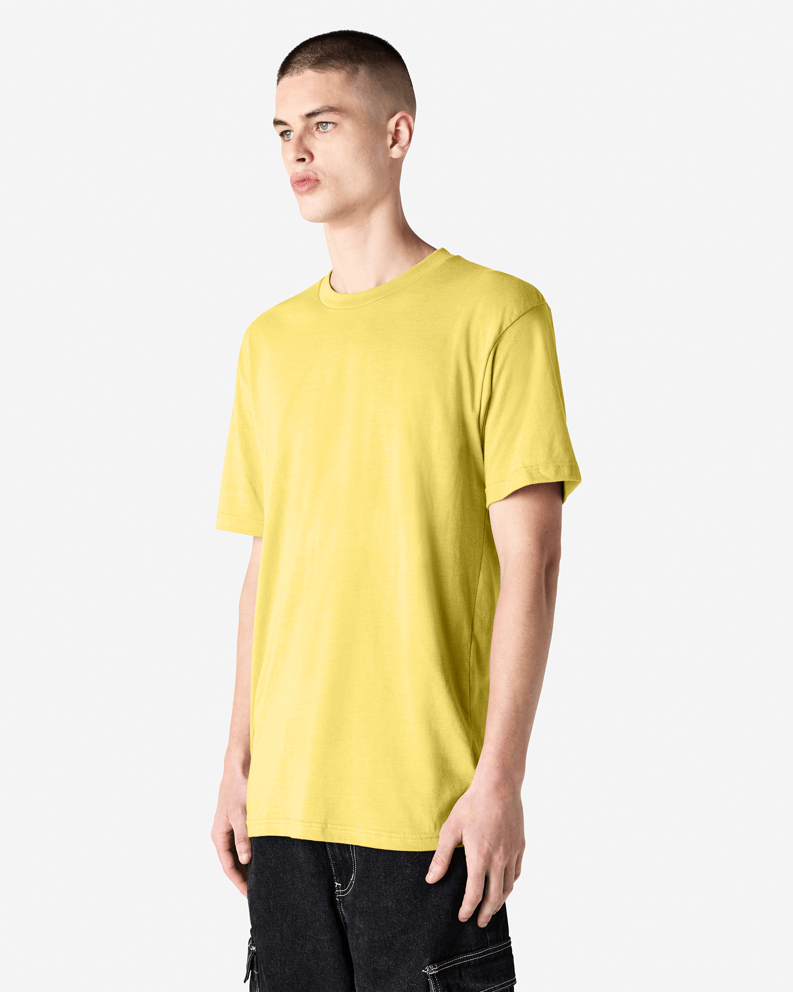 Male model wearing heather pannacotta colour CVC Unisex Short Sleeve Crew Neck Tee (front pose) -heather pannacotta