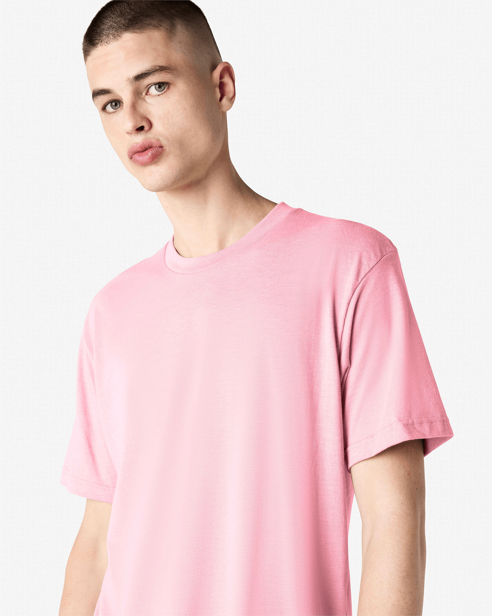 Male model wearing heather pink colour CVC Unisex Short Sleeve Crew Neck Tee (front pose) -heather pink