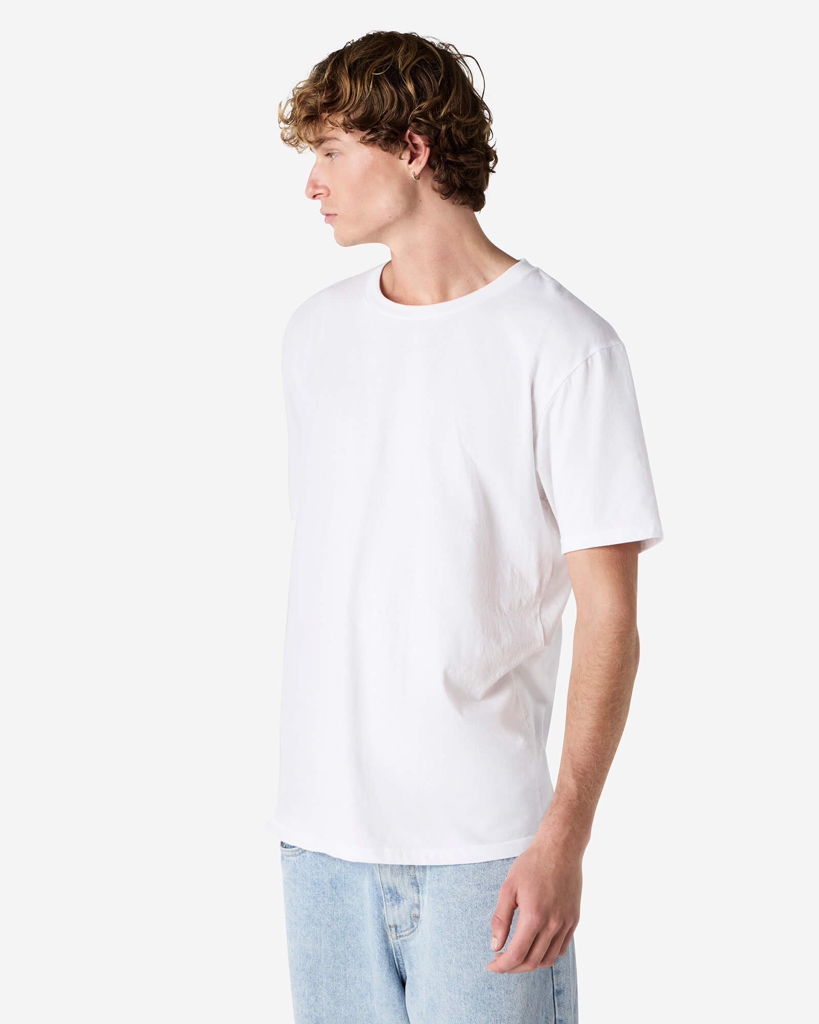 Male model wearing white colour CVC Unisex Short Sleeve Crew Neck Tee (side pose) -white