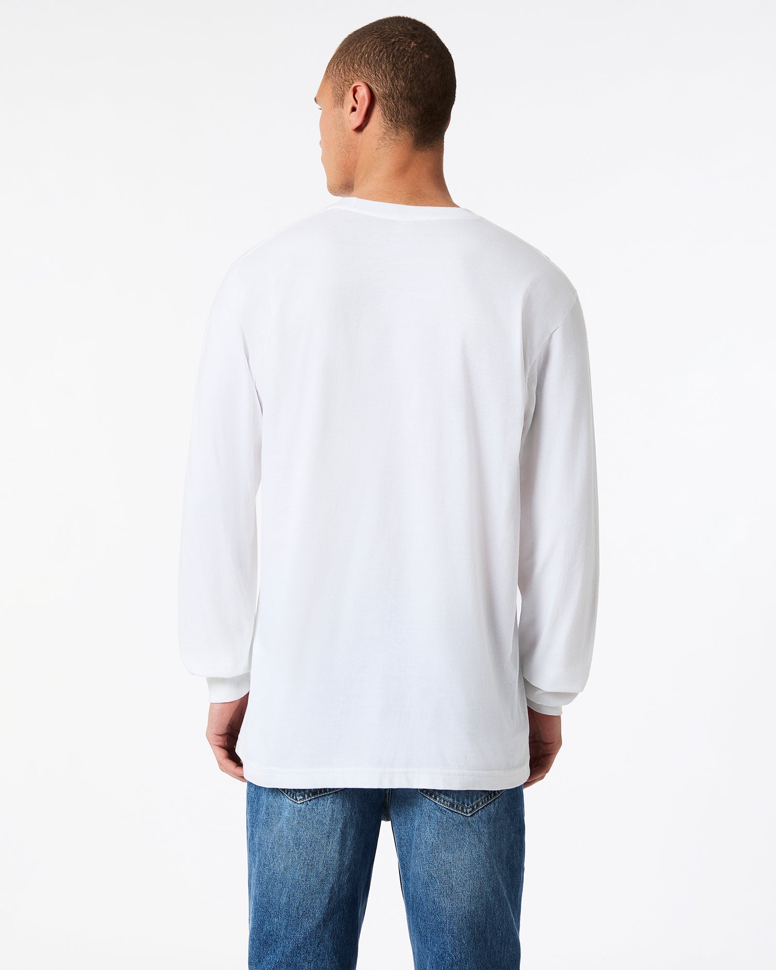 male model wearing American Apparel white Colour Fine Jersey Unisex Long Sleeve Crew Neck T-shirt- back pose