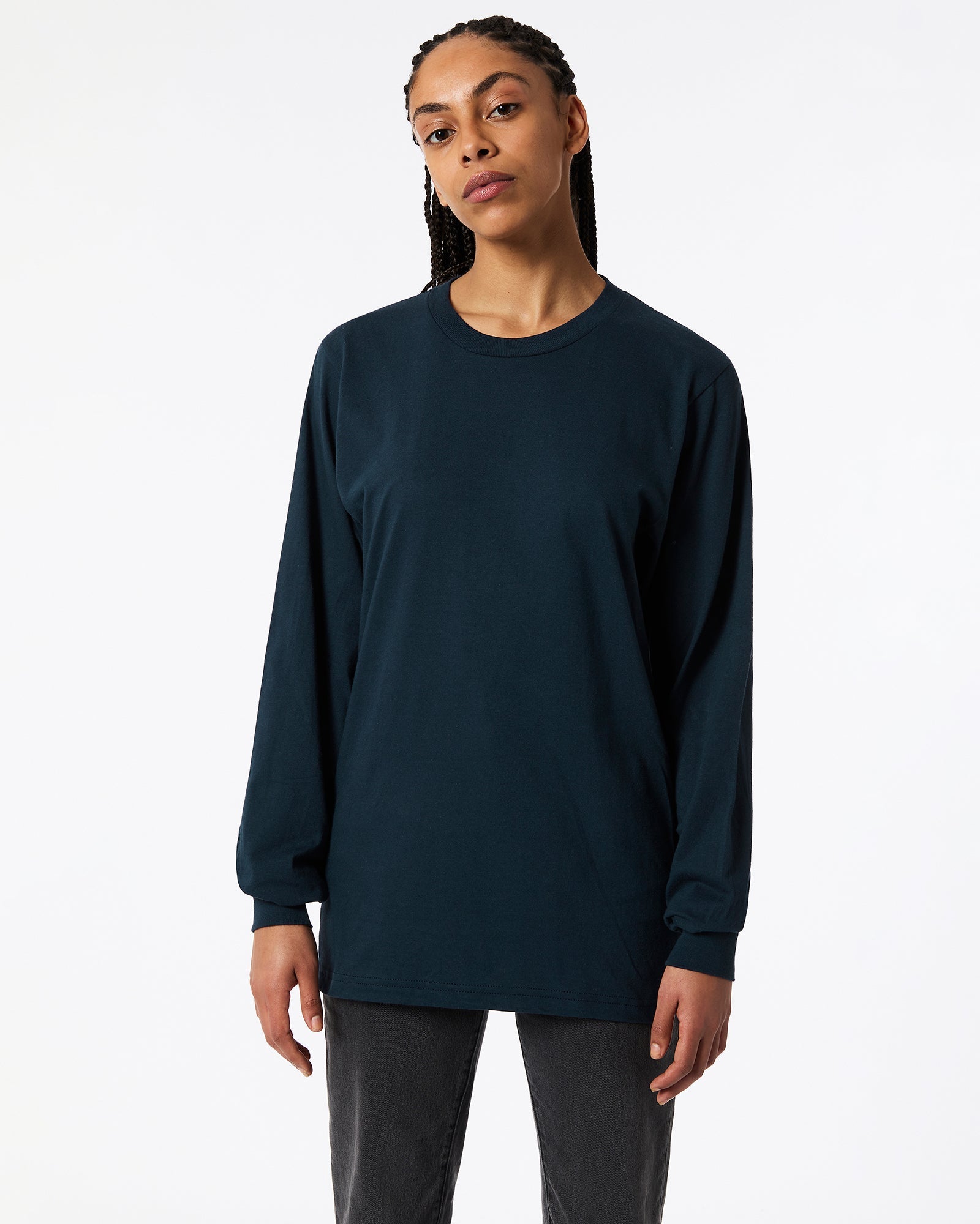 Female model wearing American Apparel Navy Colour Fine Jersey Unisex Long Sleeve Crew Neck T-shirt- Front pose