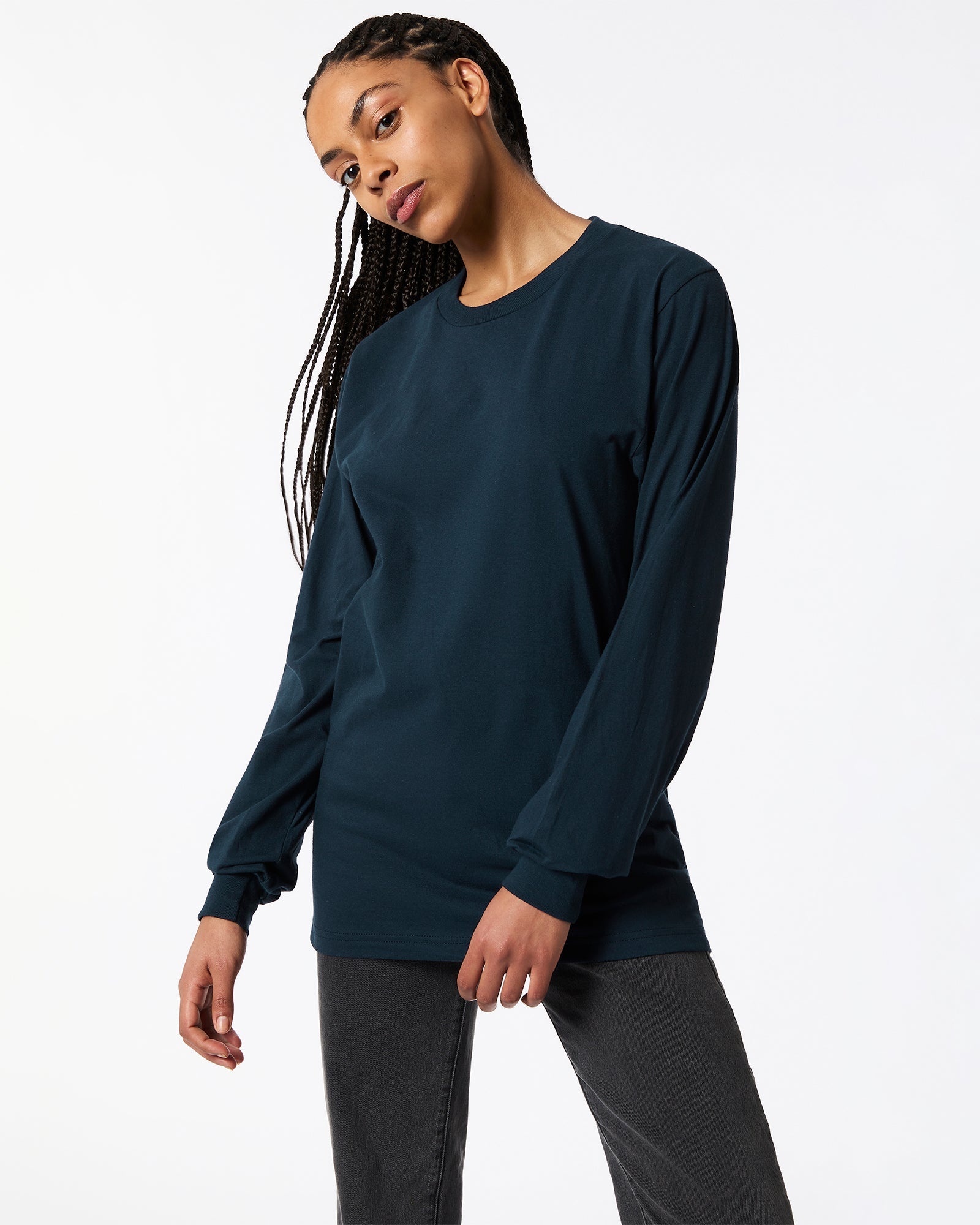 Female model wearing American Apparel Navy Colour Fine Jersey Unisex Long Sleeve Crew Neck T-shirt- Front pose