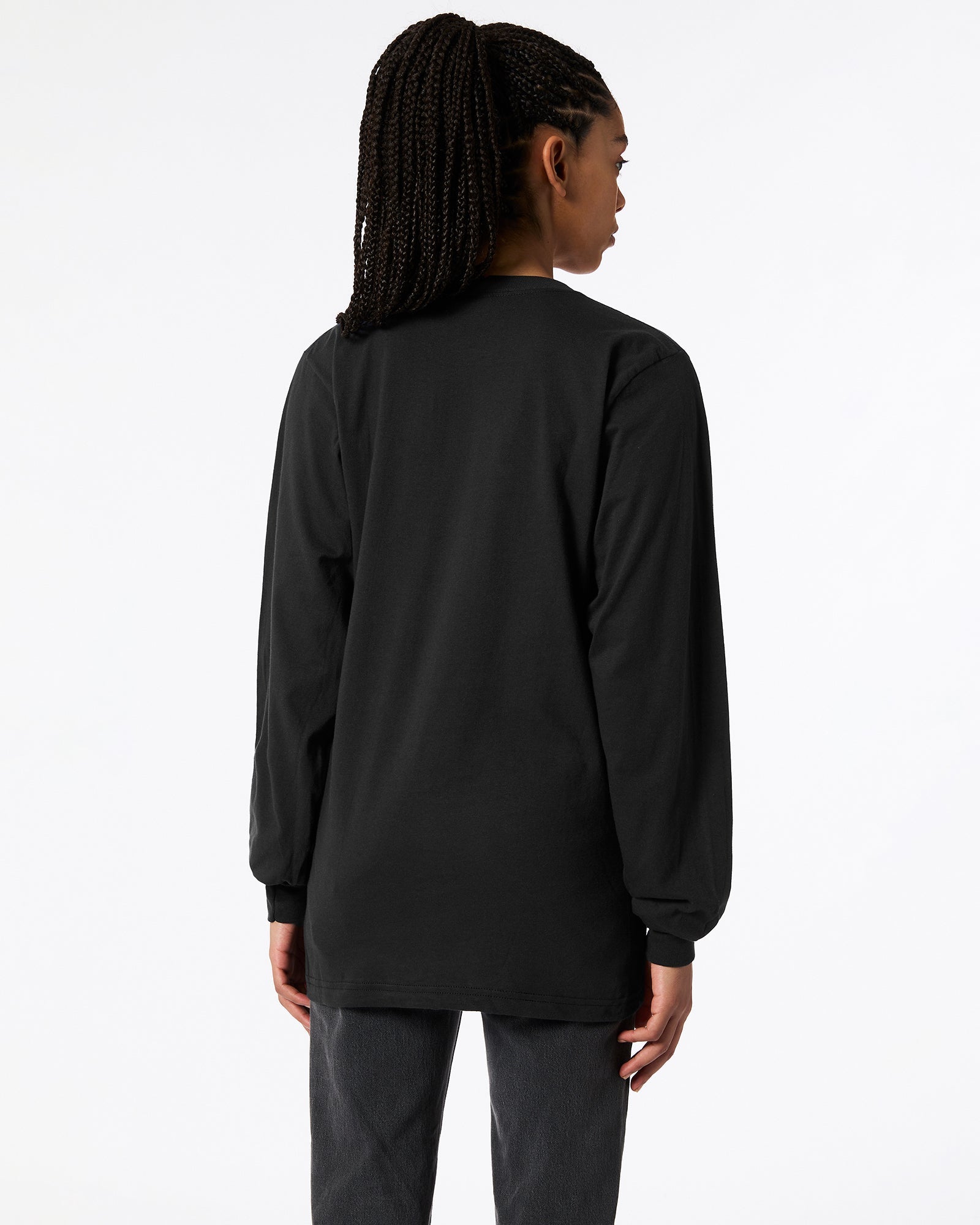 Female model wearing Black Colour Fine Jersey Unisex Long Sleeve Crew Neck T-shirt- Back pose