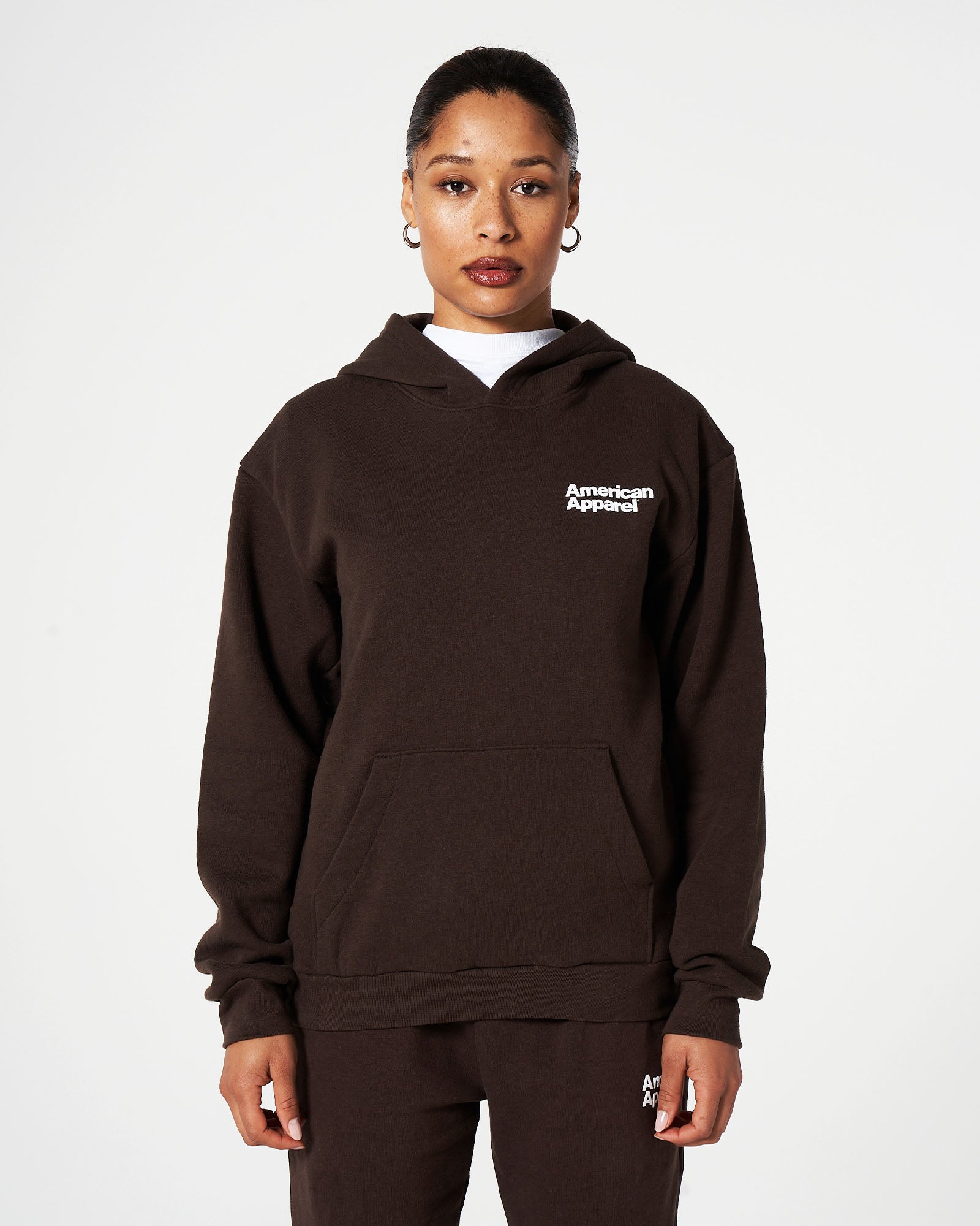 Female model wearing Brown American Apparel Pocket Puff Print Logo Tracksuit Set