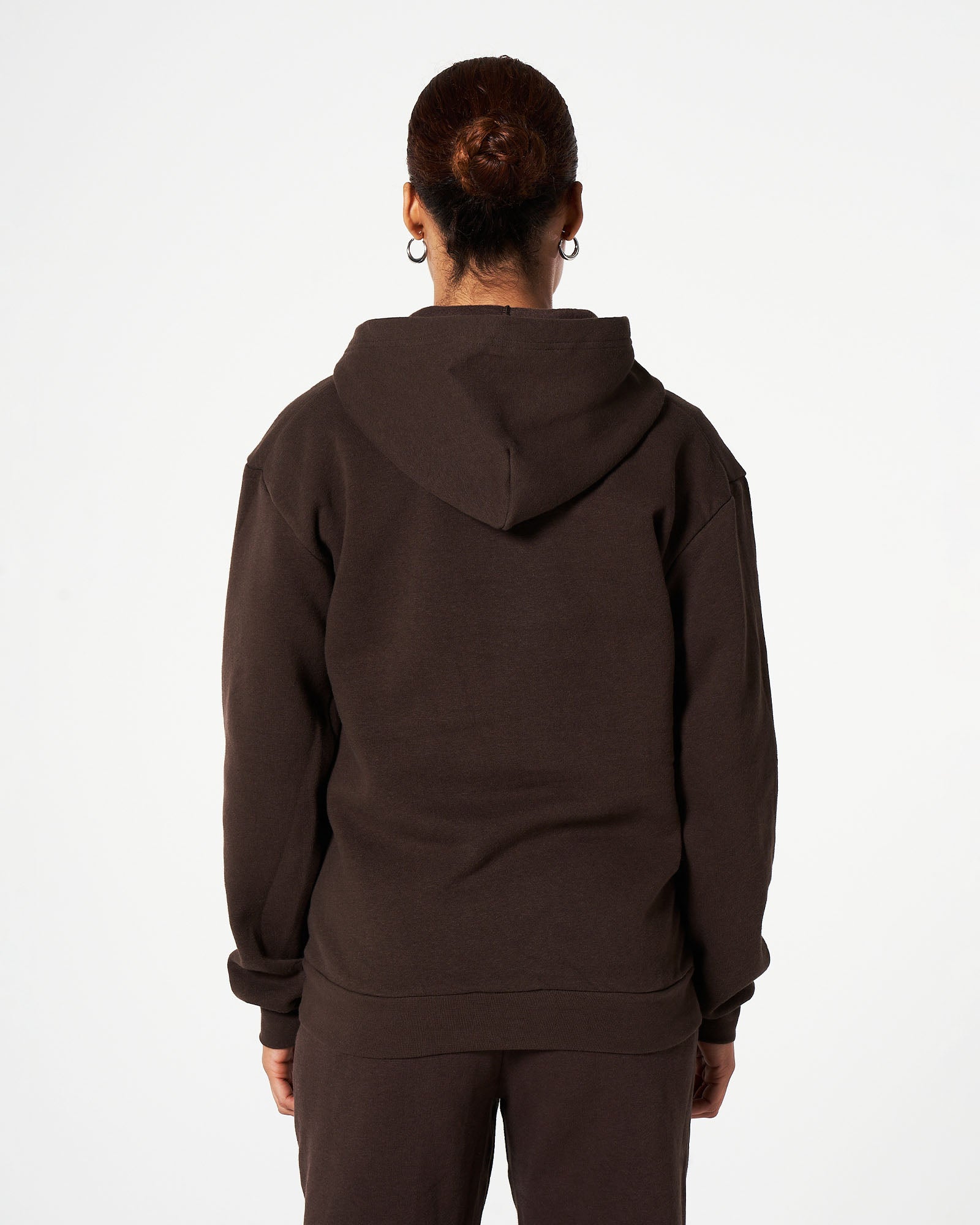 Female model showing back side of Brown American Apparel Pocket Puff Print Logo Tracksuit Set