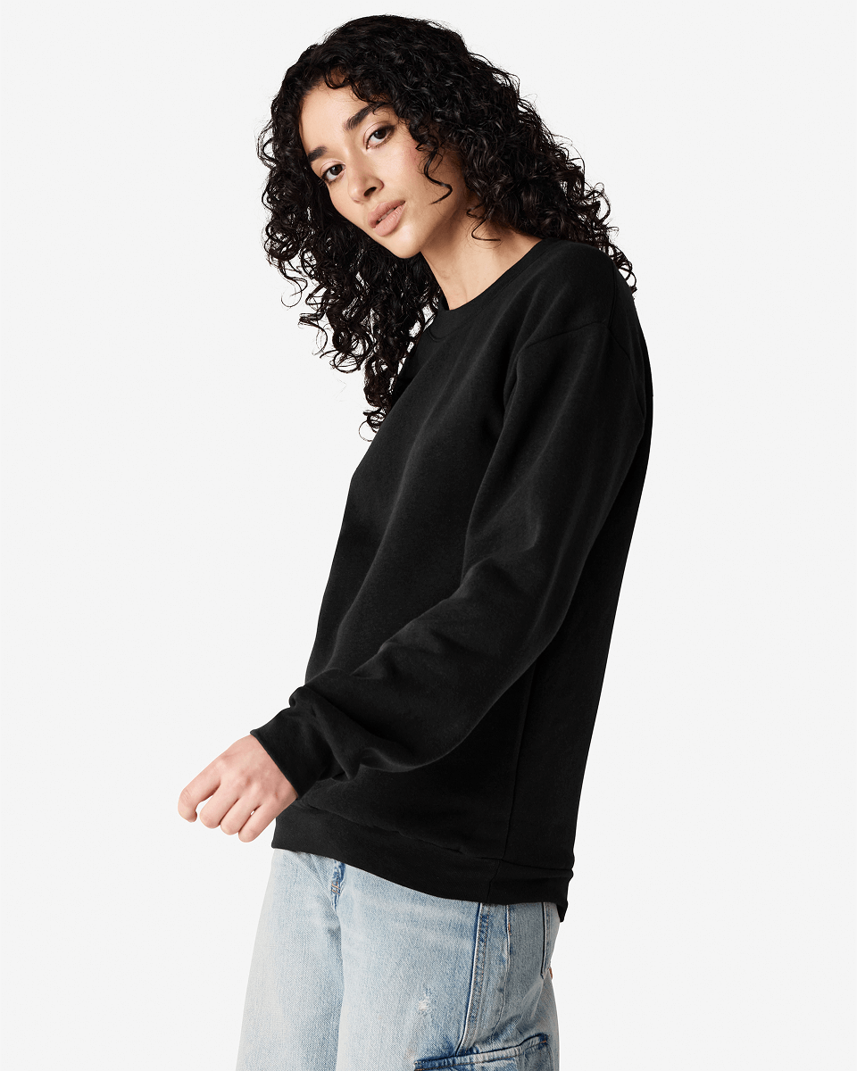 Female  model wearing a Reflex Unisex Crewneck Sweatshirt (side pose) -black