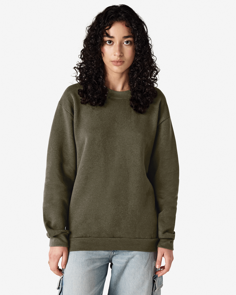 Female model wearing a Reflex Unisex Crewneck Sweatshirt (front pose) -lieutenant